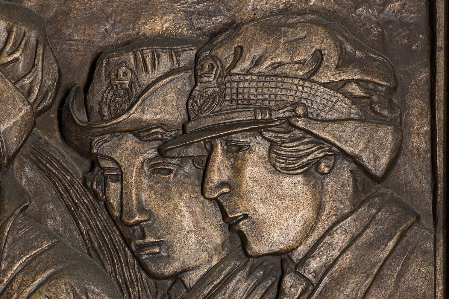 WRNS Officer, WRAF.  Bronze frieze on east side of the shrine.  Frieze by Morris and Alice Meredith Williams.