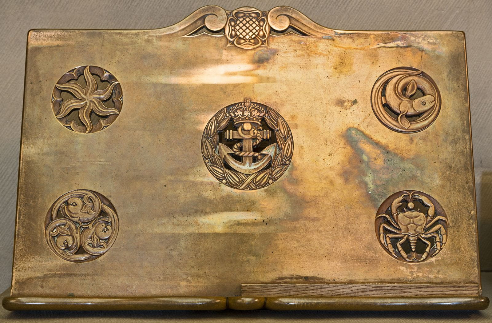 One of two book rests for the Rolls of Honour of the Royal Navy.  Hall of Honour.  Bronze.  Probably by Pilkington Jackson.