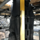 Renewing the gold leaf on Saltire finial atop the Memorial